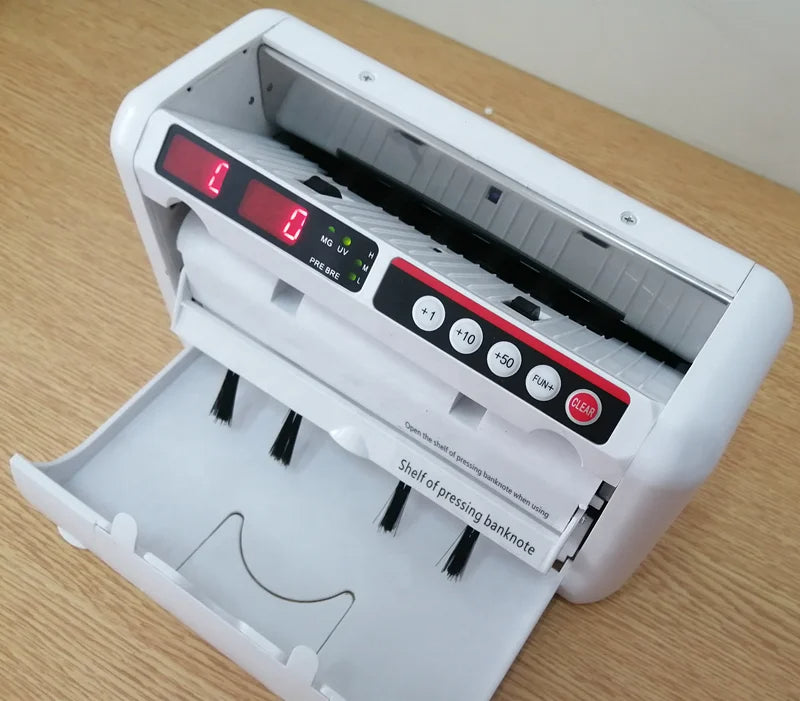 آلة عد النقود المحمولة