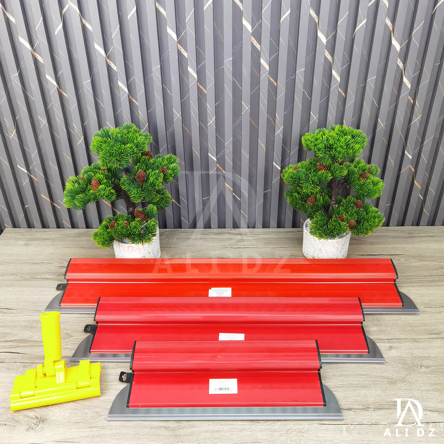 مجموعة أدوات لتسوية الحائط أحمر