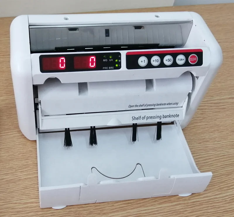 آلة عد النقود المحمولة