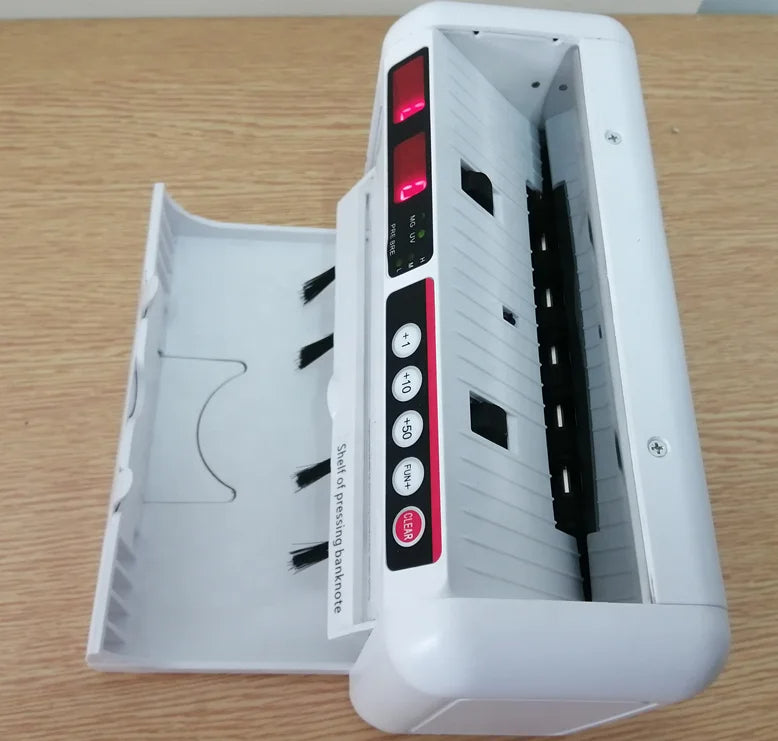 آلة عد النقود المحمولة